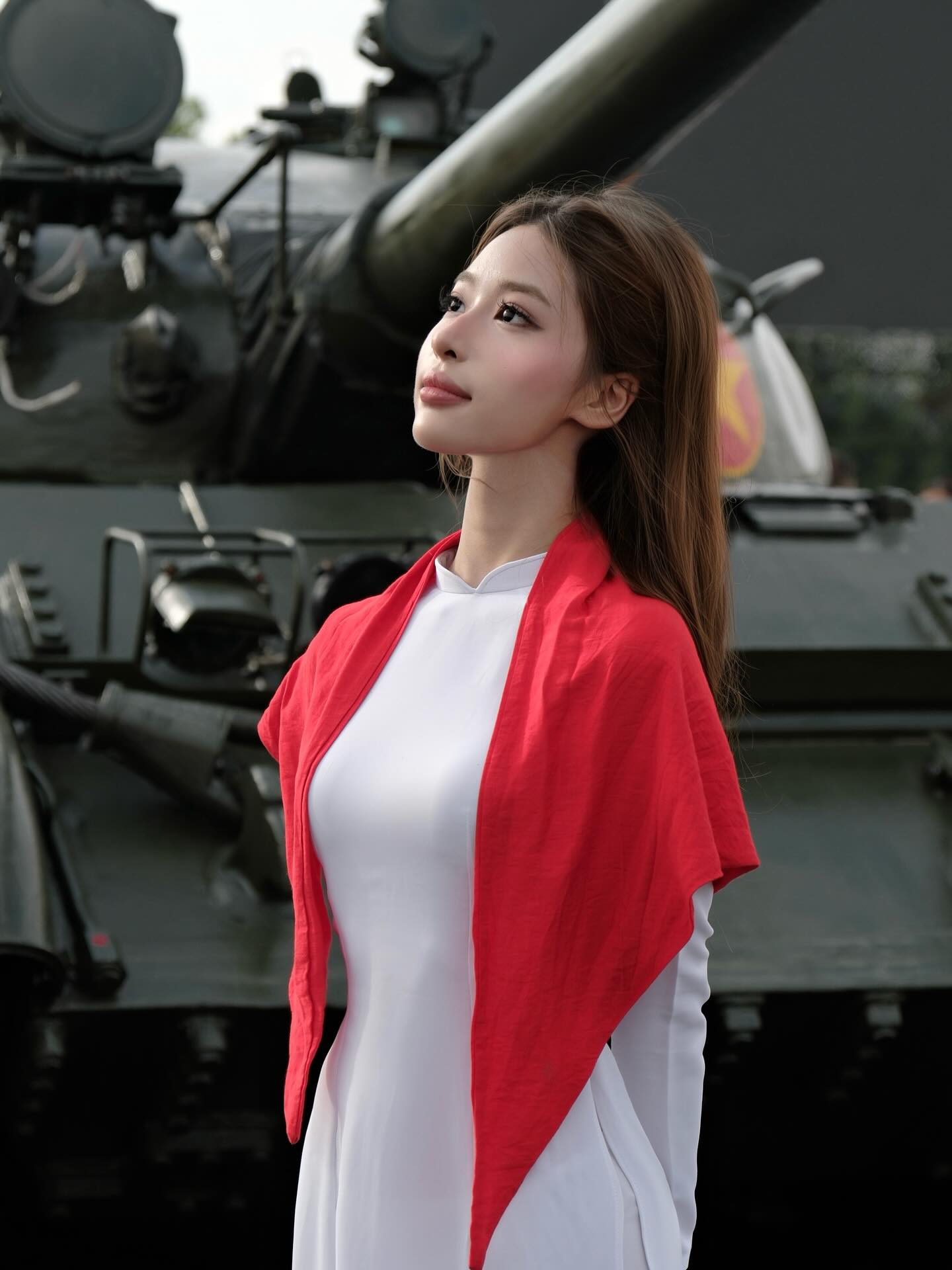 white ao dai and red scarf